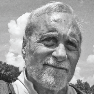 Black and white photo of author Ronald O. Kaiser